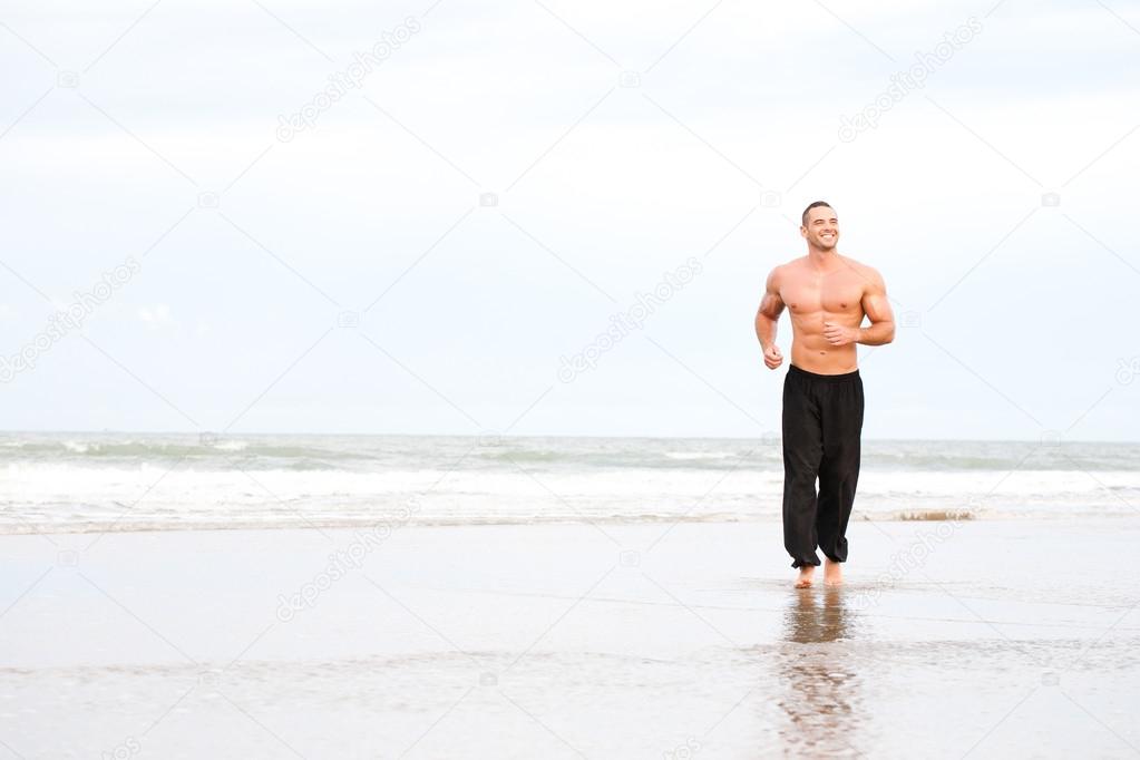 ... image young handsome muscular man running on the beach young handsome ... image young handsome muscular man running on the beach young handsome