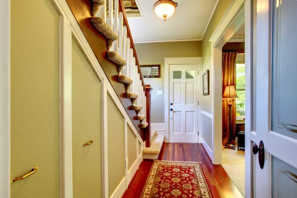 Home classsic decor hallway with entrance front door.