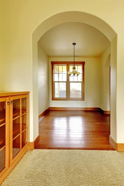 Arch with empty room and wood cabinet. New luxury home interior.