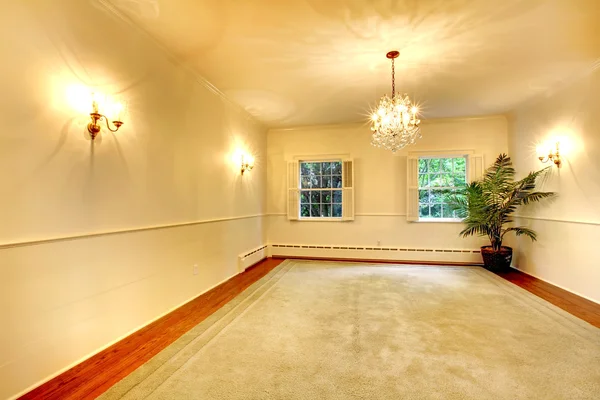 Empty luury antique large dining room interior with white walls.