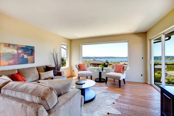 Charming bright living room with walkout deck