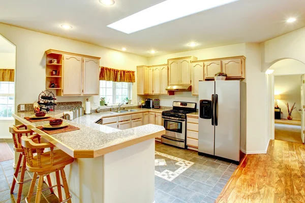 Amazing bright kitchen with maple storage combination