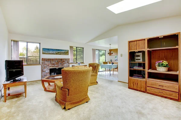 Living room with fireplace and antique chairs