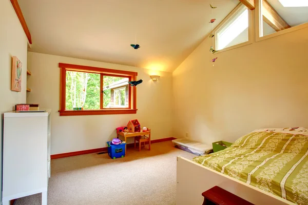 Beautiful kids room with high ceiling