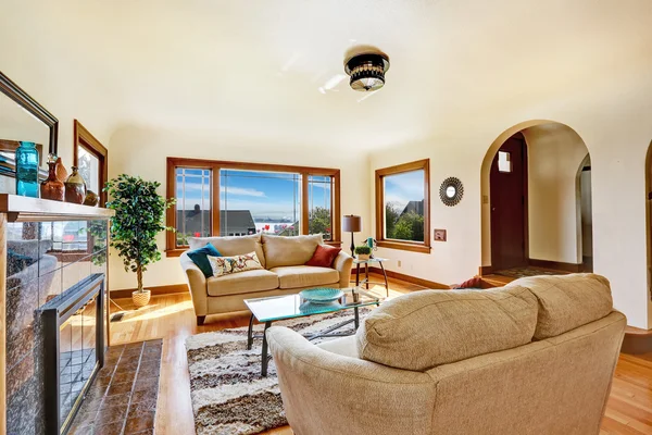 Bright living room in light ivory tones