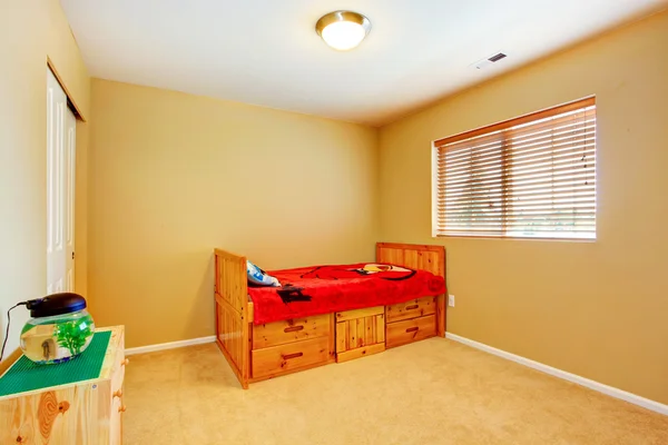 Kidss room with wooden bed