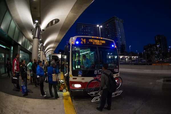 Passengers Boarding a TTC Bus