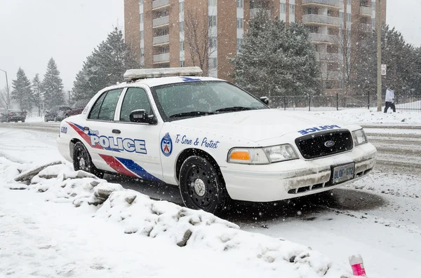 Toronto Police Car under the snow