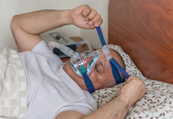 Obese man suffering from sleep apnea