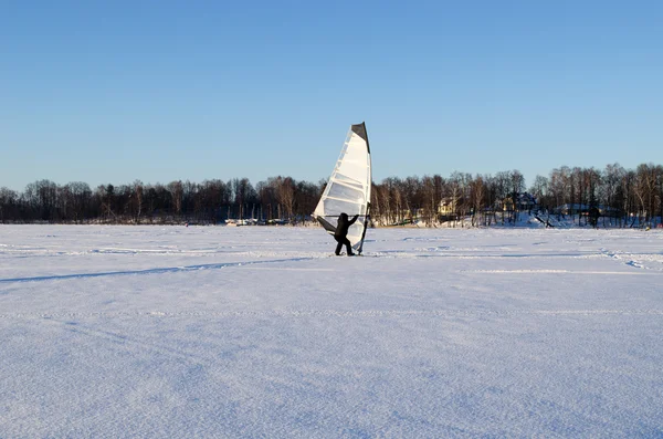 Ice surfer man wind sail frozen lake winter sport