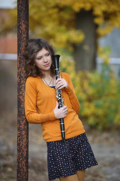 The girl with the clarinet in his hands