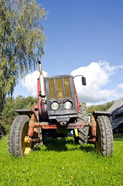 Ancient tractor in farm