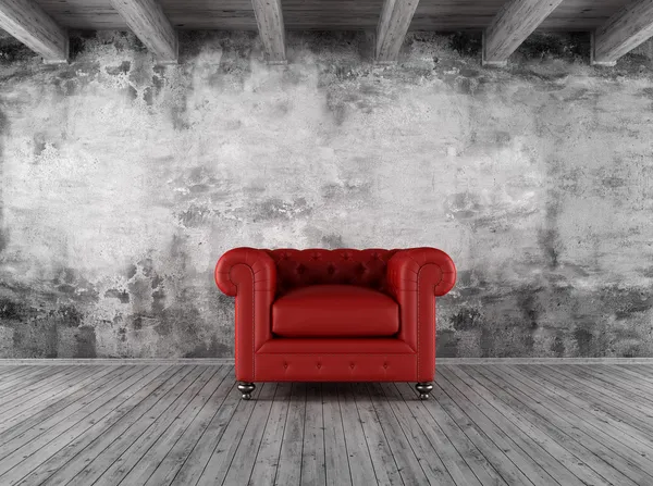 Grunge interior with red armchair — Stock Photo #13165729
