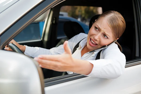 Angry female driving the car