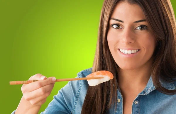 Portrait Of A Young Woman Eating Sushi