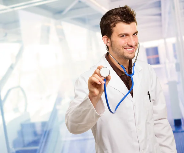 Young Male Doctor Doing Check Up