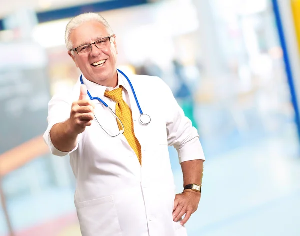 Happy Male Doctor With Thumbs Up