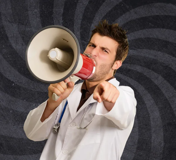 Doctor Shouting In Megaphone And Gesturing