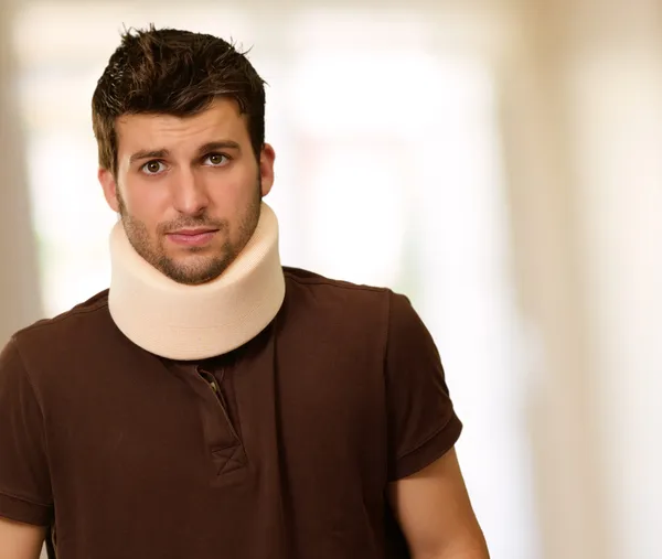 Young Man With Neck Brace
