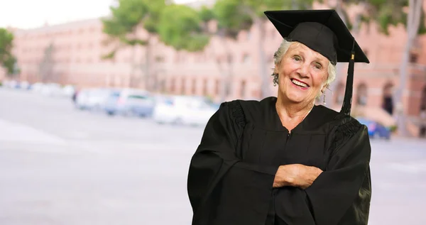 Senior Graduate Woman With Hands Folded