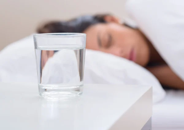 Glass Of Water Beside Bed