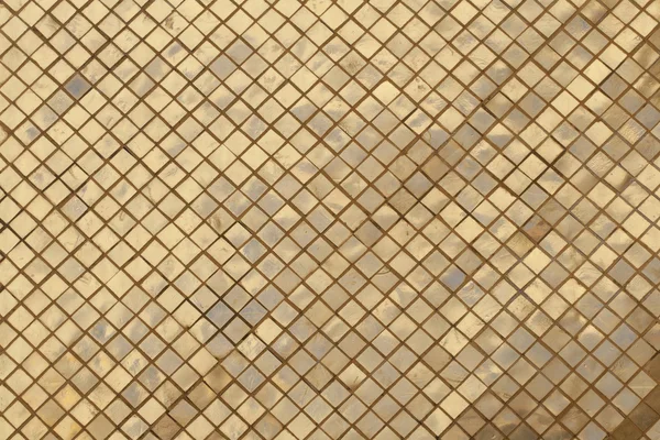 The wall with golden mosaic in Grand palace, Thailand