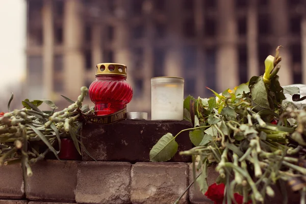 Kiev, Ukraine, February: flowers, lamps in memory