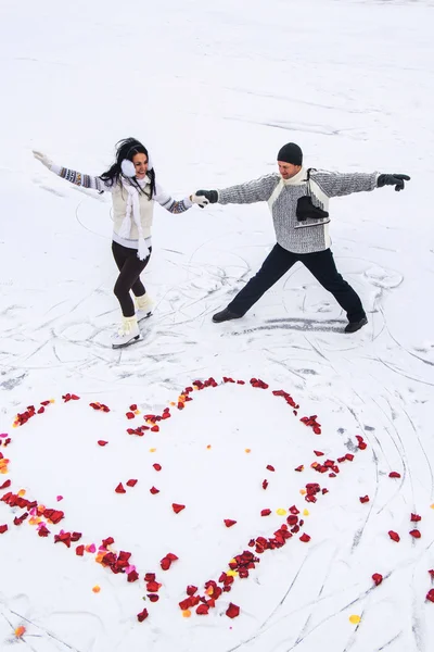 Man and woman on skates