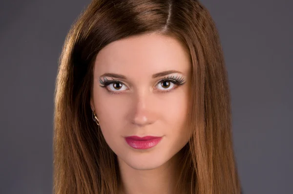 Art makeup close-up on the face model