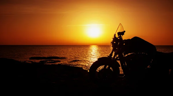 Motorcycle on sunset