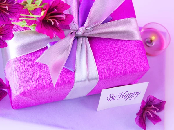 Pink gift box with flowers