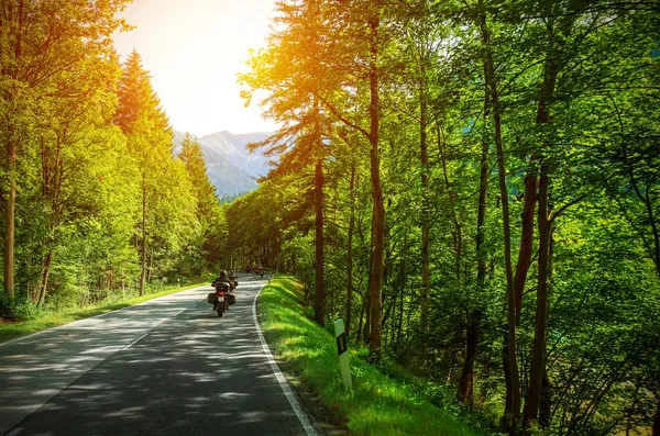 Biker on mountainous road