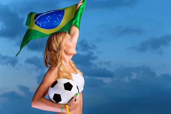 Happy fan of Brazilian football team