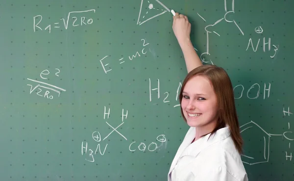 Female college student presents in a laboratory