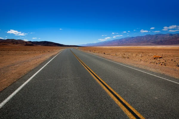 Deserted Route 190 highway in Death Valley California