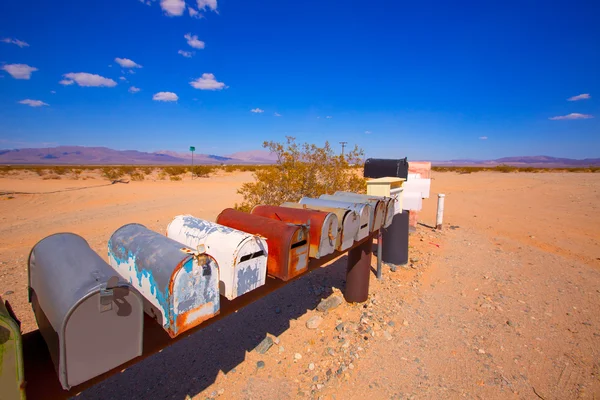 Grunge mail boxes in California Mohave desert USA
