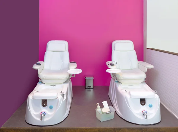 Nail saloon Pedicure chair spa furniture in pink wall