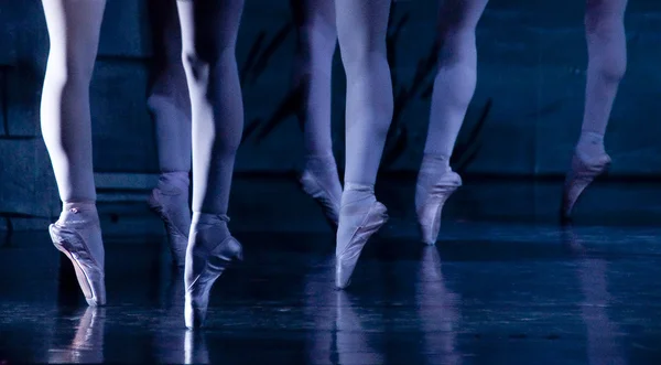 Feet of ballerinas.