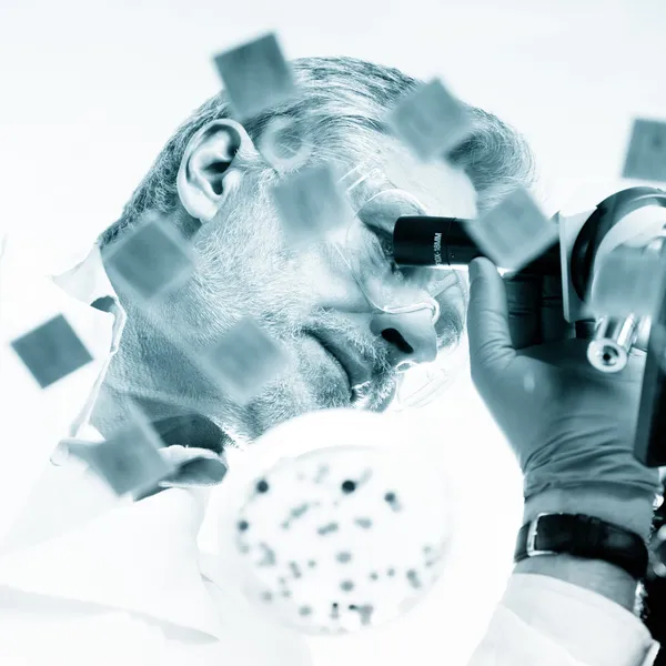 Life science researcher microscoping.