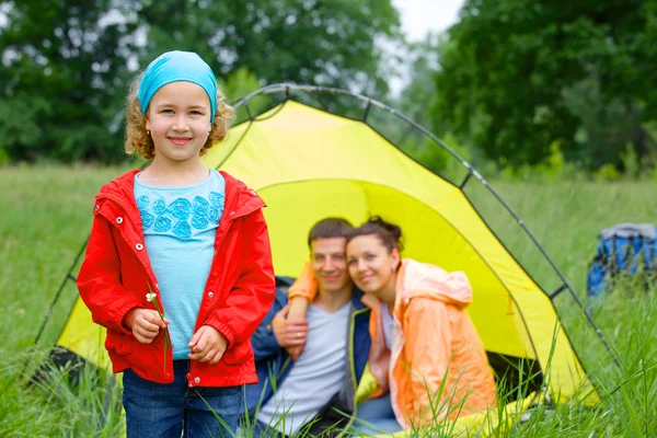 Young girl camping