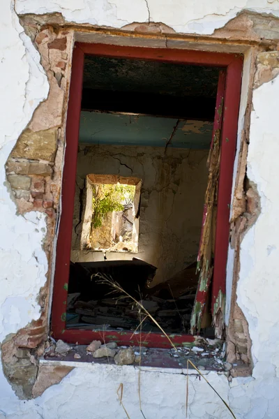 Old window in destroyed house
