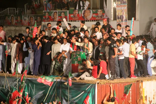 Imran Khan on stage delivering Speech