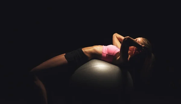 Fitness Woman Doing Workout on a Yoga Ball