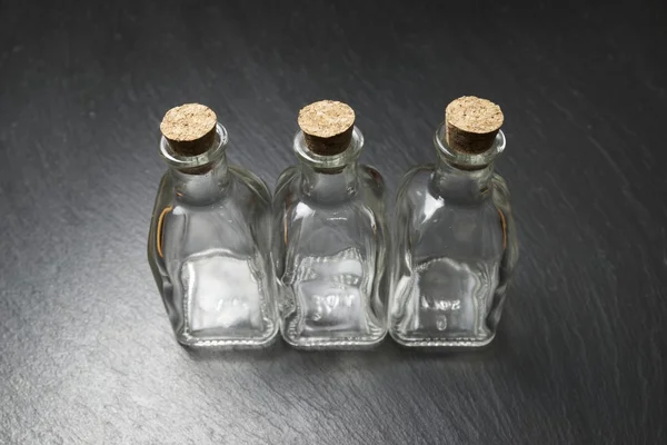 Small empty bottles