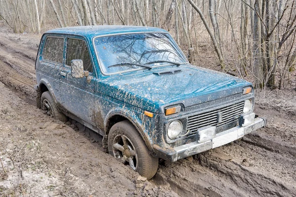 Russian-made SUV on a forest road