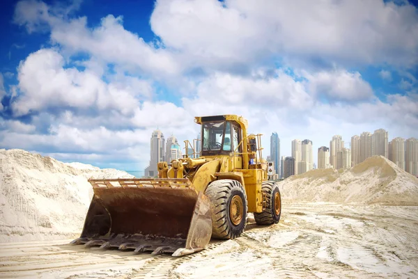 Construction tractor in Dubai Palm island Beach