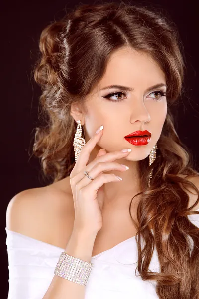 Elegant girl with red lips. Beautiful Woman. Hairstyle. Makeup.