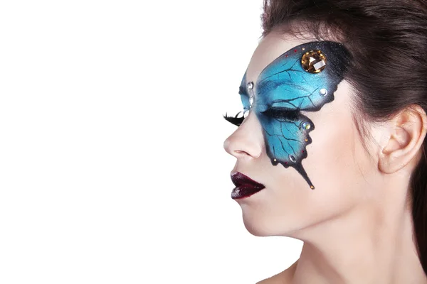 Color face art portrait. Fashion Make up. Butterfly makeup on fa