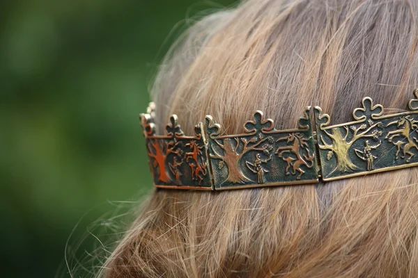 Close up of person with medieval crown