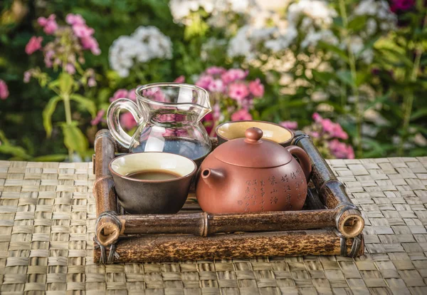 Tea set on a bamboo tray